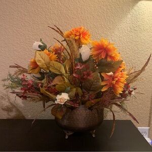 Large fall faux floral arrangement in metal decorative pot